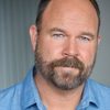 Mark Rowe as Chuck Calhoun