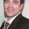 Jon Tenney as Kevin