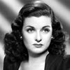 Joan Bennett as Mrs. Cummings