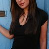 Renata Batista as Dead Woman in Alley