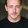 Chris Coy as Blue Hoodie