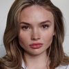Natalie Alyn Lind as Cora Lewis