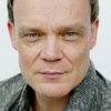 Joel Tobeck as Alistair