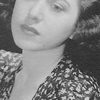 Eda Reiss Merin as Rabbi's Wife