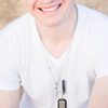 Justin Arnold as Travis