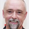 David Alford as Reverend