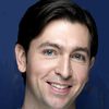 Nicholas Braun as Woodrow K. Mullhand, CFP