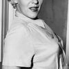 Vici Raaf as Peggy (uncredited)