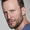 Bodhi Elfman as Photo Cashier