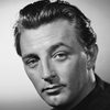 Robert Mitchum as John Dickinson