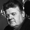 Robbie Coltrane as Doctor