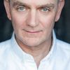 Nicholas Murchie as Bus Conductor