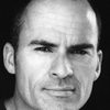 Mark Derwin as Coach Lyons