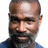 Tunde Adebimpe as Dexter