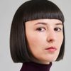 Svitlana Karabut as Nightclub DJ
