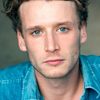 Jordan Mooney as Young Gunner