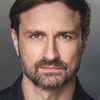 Alex Skarbek as Maurice (Patron)