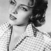 Anne Neyland as Laury Jackson