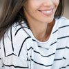 Irene Cassanelli as Hostess
