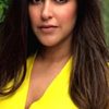 Neha Dhupia as Munni Madame