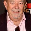 Robin Leach as Second Reporter