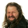 Bruce Glover as Grady Coker
