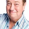 Jonathan Coleman as Radio Announcer #3 (voice)
