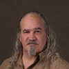 John M. Maiers as Background Cast