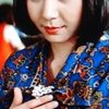 Yōko Koizumi as Yumi