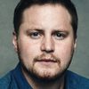 Justin Hofstad as Tommy