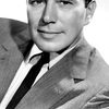 John Forsythe as Lt. Elwood Forbes