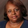 Maxine Barnett as Mama Cynthia