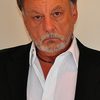 Manny Greenfield as Bank Man
