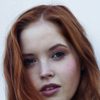 Ellie Bamber as Elena
