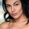 Suraya Rose Santos as Rat King/ Female News Anchor