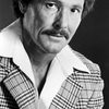 William Smith as Patterson the Cop