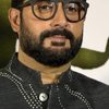 Abhishek Bachchan as Rishi Talwar