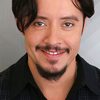 Efren Ramirez as The Traveler