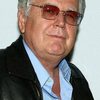 Greydon Clark as Wilson's Man on Phone (voice)
