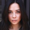 Malese Jow as Sarah Adams