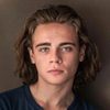 Christopher Dylan White as College Student