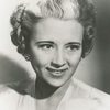 Bess Flowers as Nightclub Patron / Woman at Airport (uncredited)