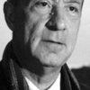 John Serret as Emigration Official