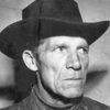 Bob Kortman as Red, the Convict Barber (uncredited)