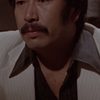 Tong Kam-Tong as One of Shih's 8 Bodyguards