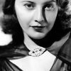 Barbara Stanwyck as Cora Sutliff