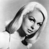 Joi Lansing as Boots Malone