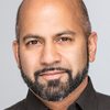Ajay Naidu as Dr. Robert Hind