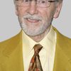 Andrew Sachs as Man in Church