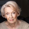 Barbara Wallace as Woman In Line